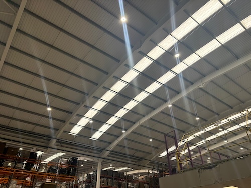High bay LED spotlights installed on warehouse roof at PackagingOne Middlewich by Portcullis Power Solutions