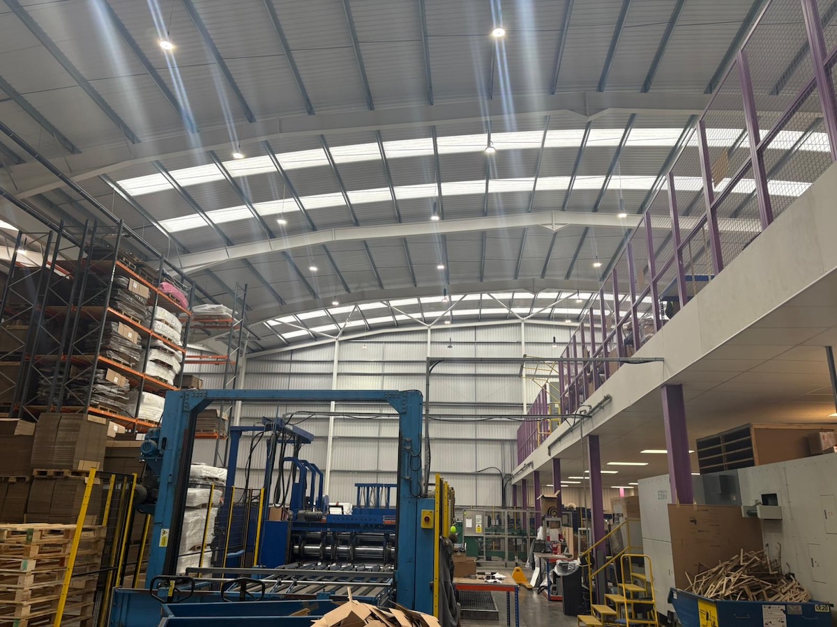 Wide view of Packaging One warehouse showing new high bay LED lighting and mezzanine in Middlewich